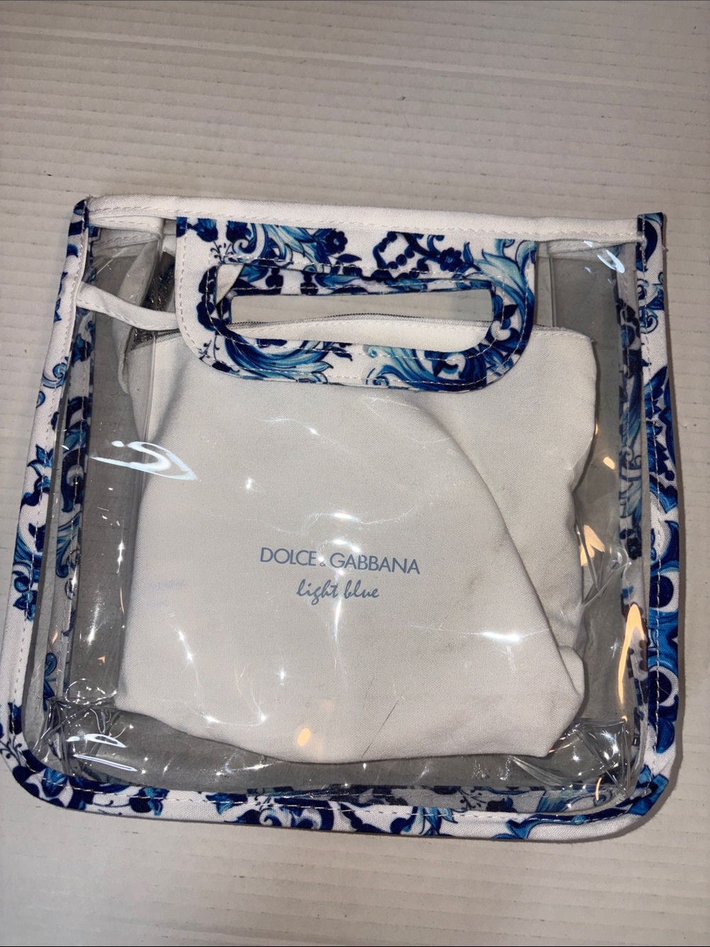 Dolce & Gabbana Clear Clutch with Blue Floral Trim and attached white pouch